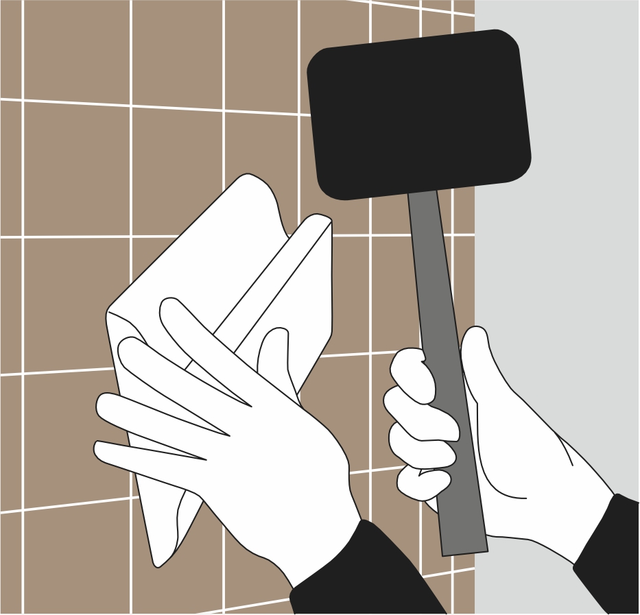 Плитки осадите легкими ударами резинового молотка.jpg